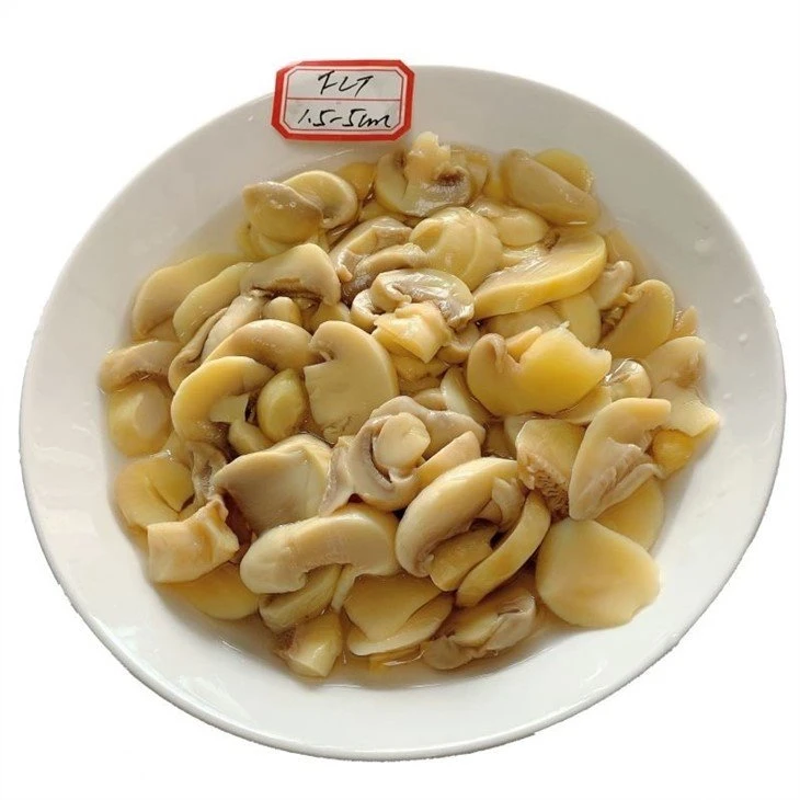 Pickled champignon mushroom in salted water in barrel